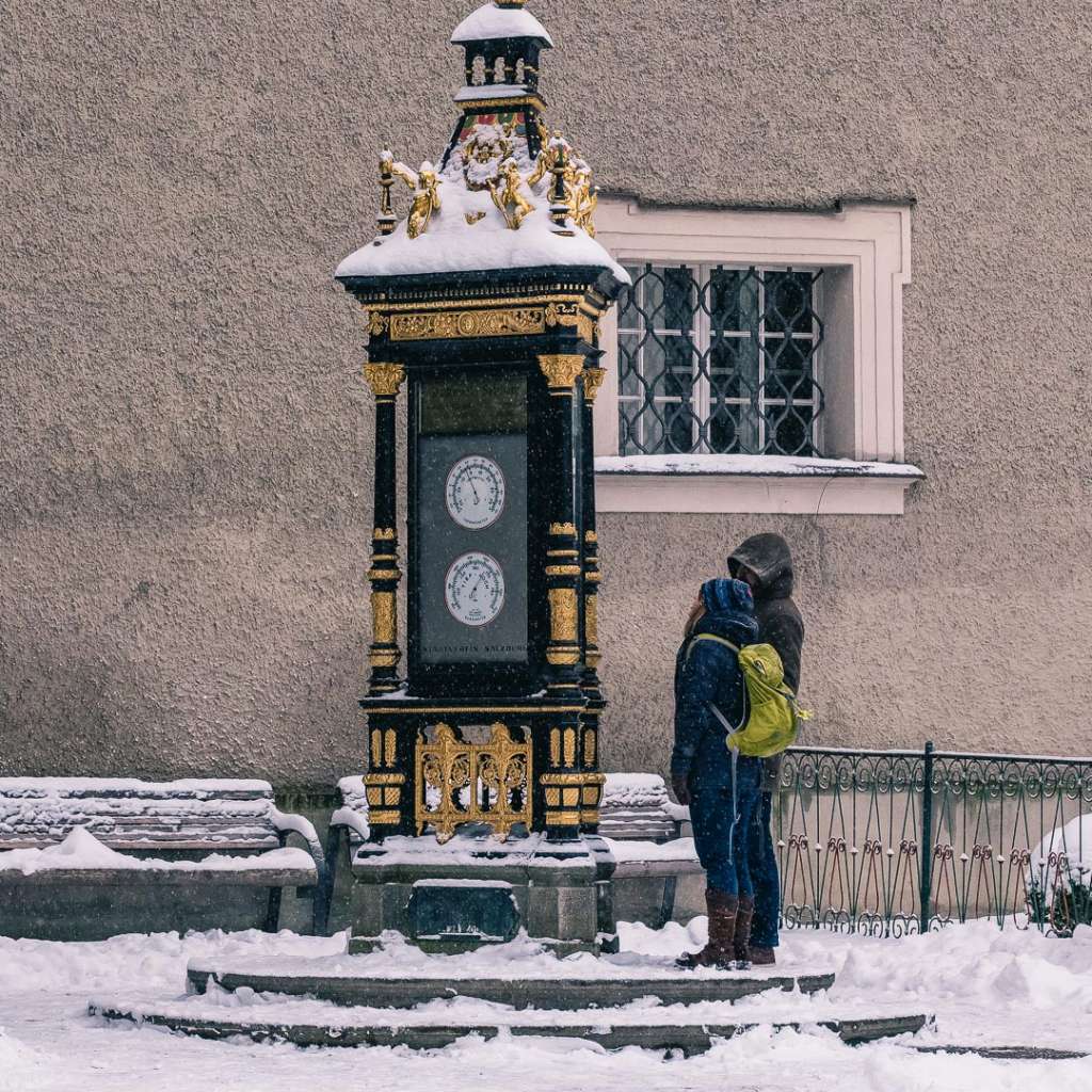 Backpackers at the Ceconi Weather Station at Alter Markt in Salzburg